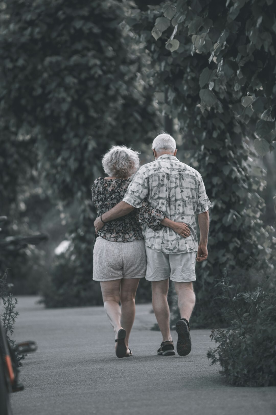 elderly people walking together