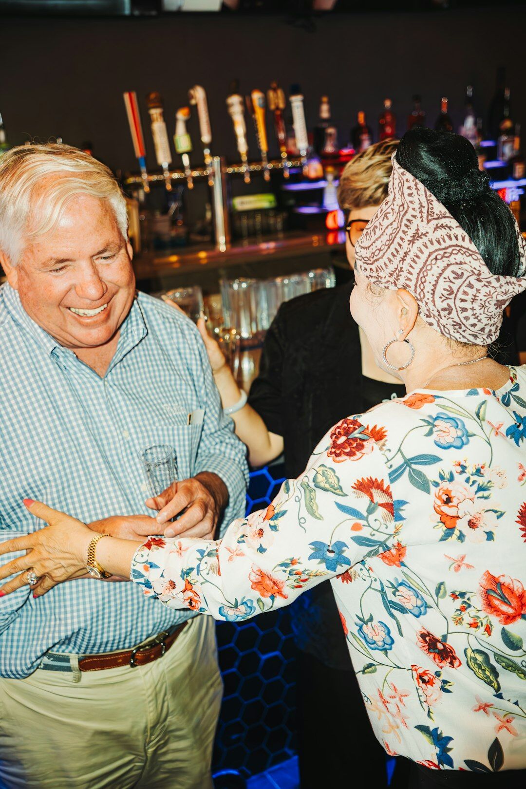 Senior couples dancing together at a social dance event
